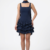 Découvrez la robe bleu marine 'Royal Grace' par Divine Dress. Coupe courte, jupe à volants et détail foulard élégant. Parfaite pour vos soirées. Achetez en ligne.